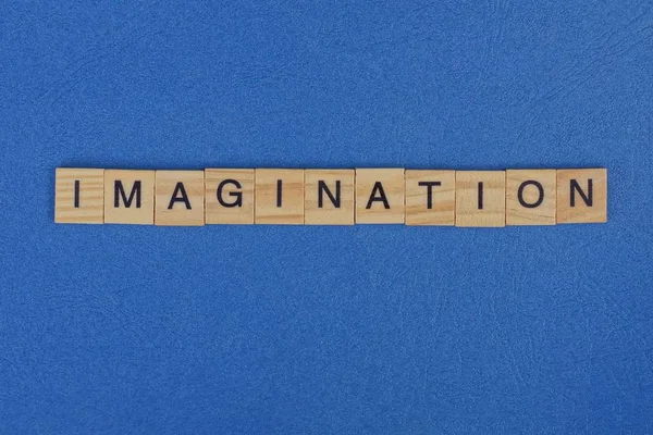 Imaginação Palavra Letras Madeira Marrom Encontra Uma Mesa Azul — Fotografia de Stock