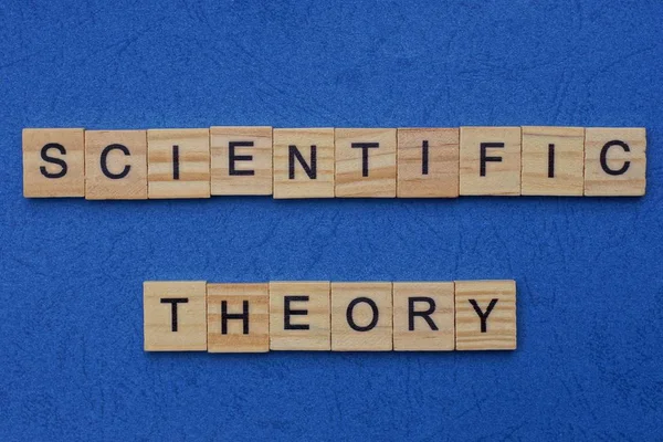 Phrase Scientific Theory Made Brown Wooden Letters Lies Blue Table — Stock Photo, Image