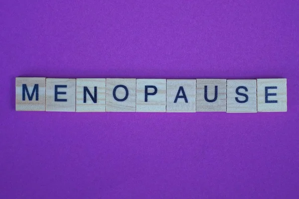 Word Menopause Small Gray Wooden Letters Lies Lilac Background — ストック写真