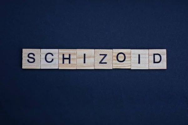 Word Schizoid Made Brown Wooden Letters Lies Black Table — Stockfoto