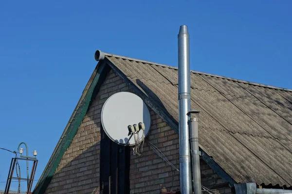 Two Metal Chimney Pipes White Satellite Dish Attic Rural House — Stock Photo, Image