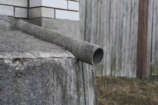 One Gray Long Drain Pipe Concrete Foundation Street — 스톡 사진