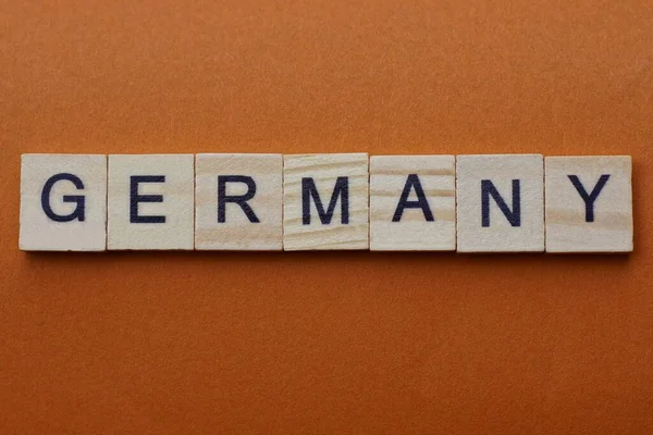 Germania Parola Grigia Piccole Lettere Legno Tavolo Marrone — Foto Stock