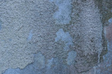 Beton eski bir duvarın koyu gri taş dokusu.