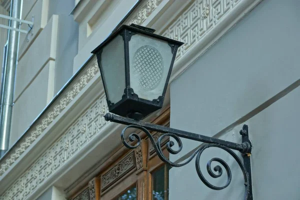 One Old Black Iron Lantern White Glass Concrete Gray Wall — Stock Photo, Image