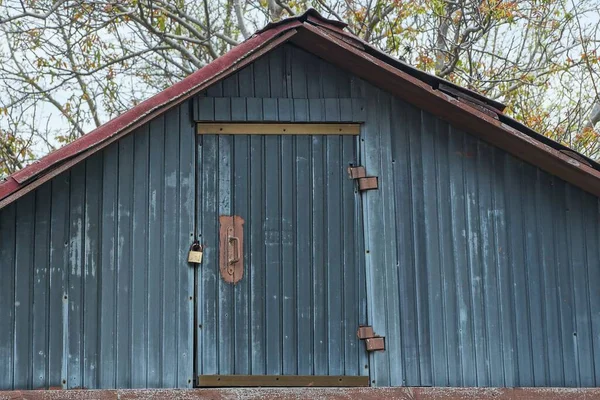 One Gray Rural Wooden Attic Closed Door — Stock Photo, Image