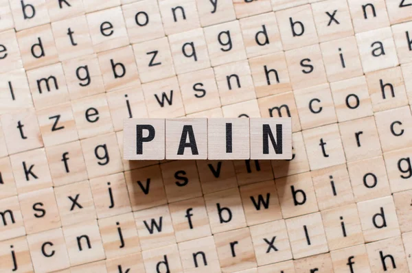 Pain word concept on cubes — Stock Photo, Image