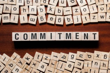 Commitment word concept on cubes clipart