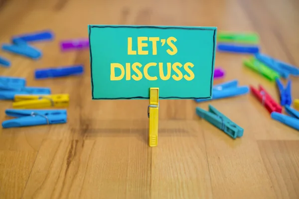 Conceptual hand writing showing Let s is Discuss. Business photo showcasing Permit to Talk Open Up Go Over a Topic Chat Sharing