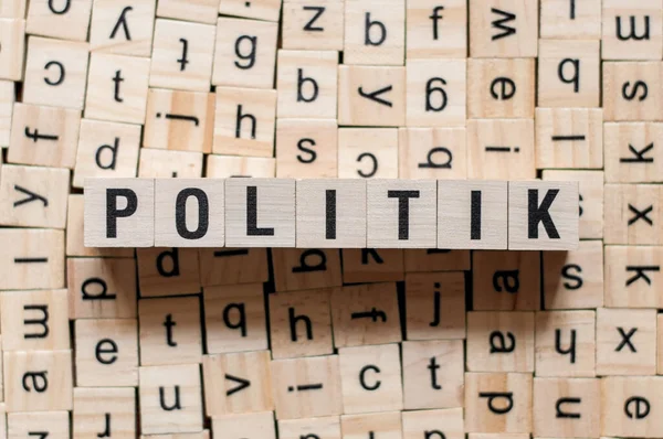 Politik - Γερμανικό κείμενο πολιτικής σε κύβους — Φωτογραφία Αρχείου