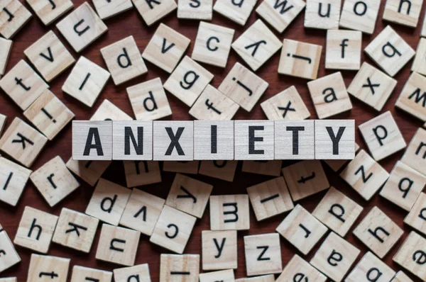 The word of ANXIETY on building blocks concept — Stock Photo, Image