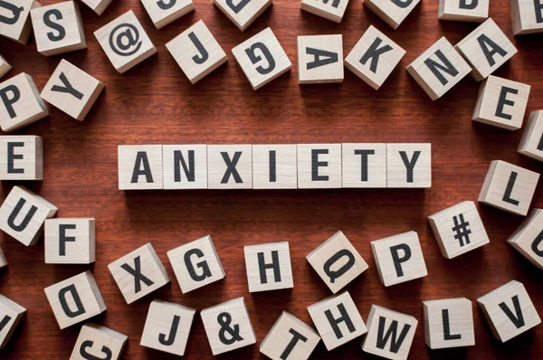 The word of ANXIETY on building blocks concept — Stock Photo, Image