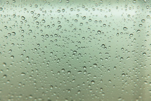 Gouttes de pluie sur fond de verre — Photo