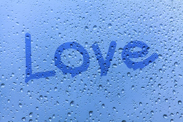A inscrição em vidro, conceito de amor — Fotografia de Stock