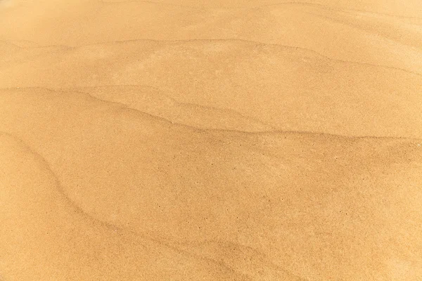 Zand strand textuur achtergrond — Stockfoto
