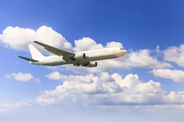 Airplane in the sky Stock Image