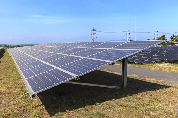 Solar panels on green field, Solar power station