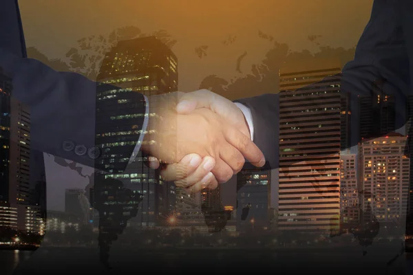 Double exposure of Businessman handshake — Stock Photo, Image