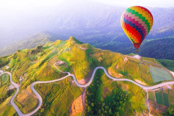 Hot air balloon on beautiful mountain — Stock Photo, Image