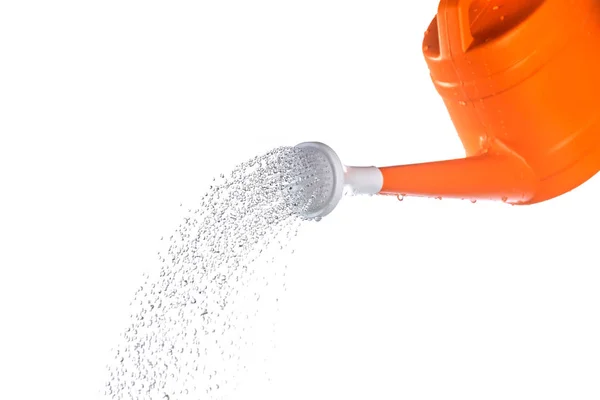 Watering can in action on white background — Stock Photo, Image