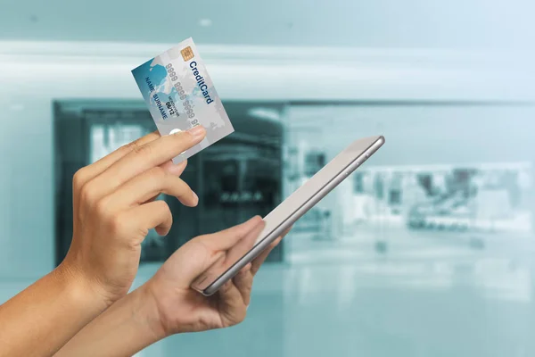 Close up of woman hands holding digital tablet with blurred of s — Stock Photo, Image