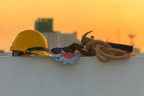 Construction helmet and Construction Tools on Construction site — Stock Photo, Image