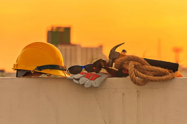 Construction helmet and Construction Tools on Construction site — Stock Photo, Image