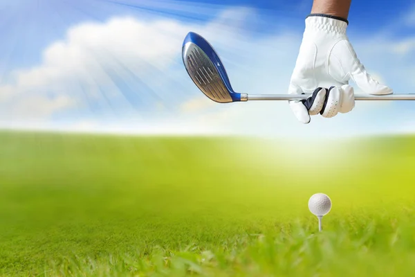 Close up of Golf player holding a golf club on golf course under — Stock Photo, Image
