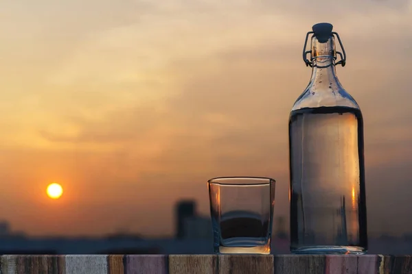 Bottles and glasses of water in the morning — Stock Photo, Image