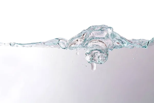 Víz hullám és a buborékok háttér textúra — Stock Fotó