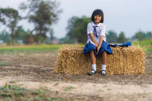 Asian student in uniform studying at countryside of Thailand — Stock Photo, Image