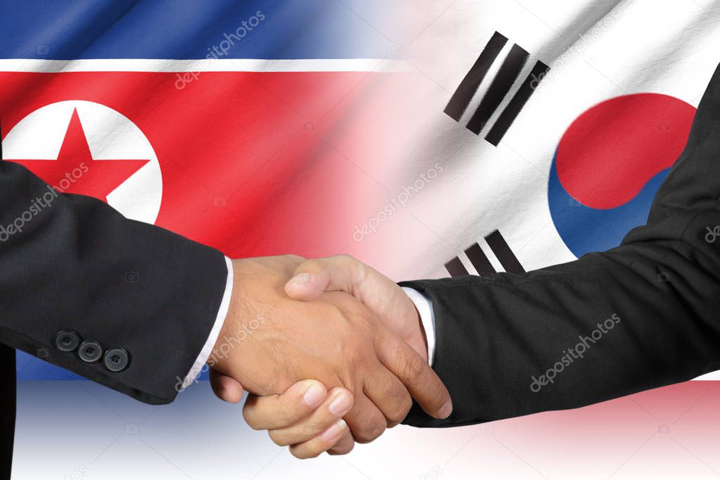 Shaking hands of South Korea and North Korea