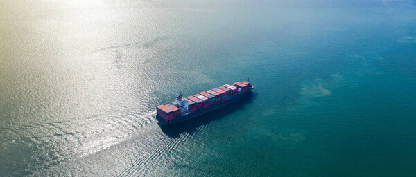 Aerial top view of Large container cargo ship in export and impo