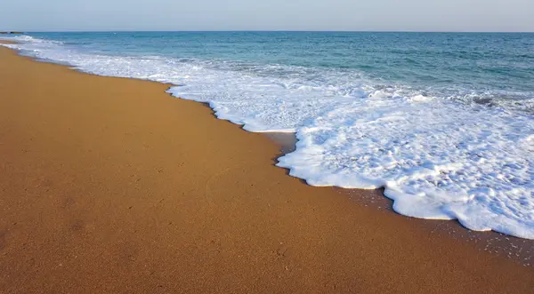 Vågor på en strand — Stockfoto