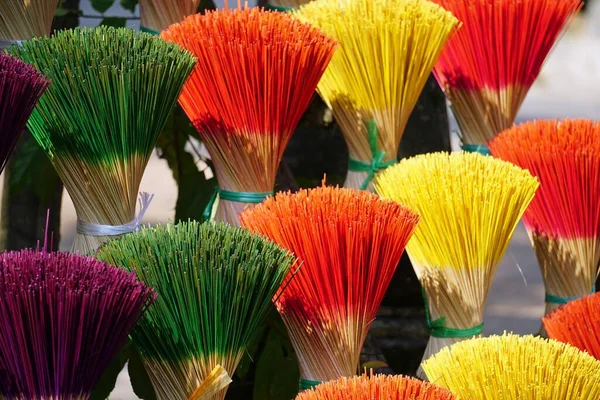 factory producing colorful incense sticks in vietnam