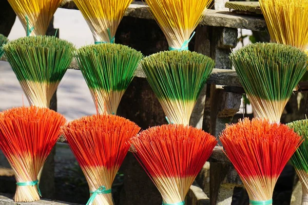factory producing colorful incense sticks in vietnam