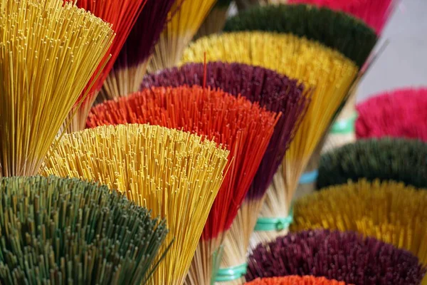 factory producing colorful incense sticks in vietnam