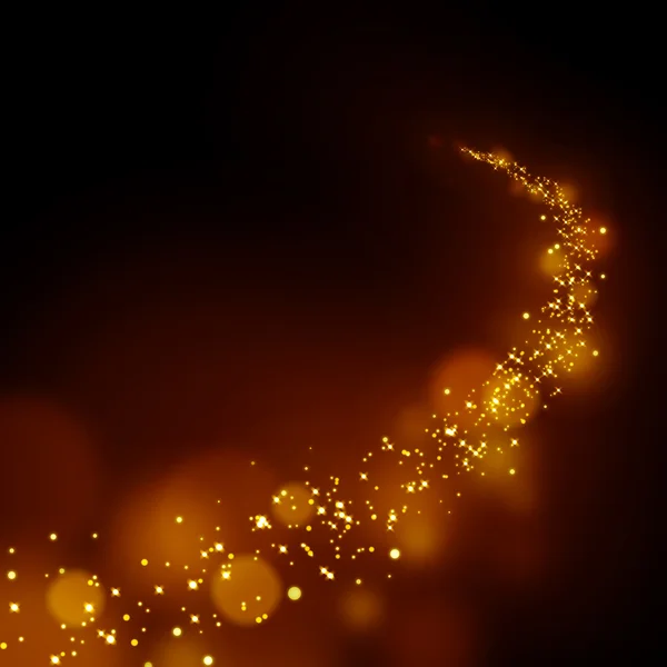Glittering stars dust trail on bokeh background — Stock Photo, Image