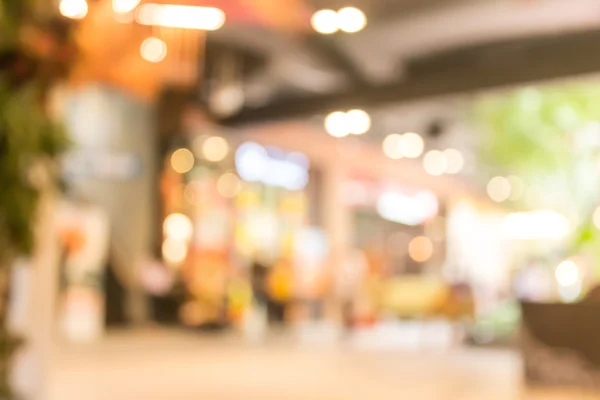 Van winkelen in warenhuis met bokeh achtergrond wazig — Stockfoto