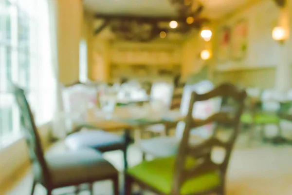 Blur restaurante com cadeira interior fundo . — Fotografia de Stock