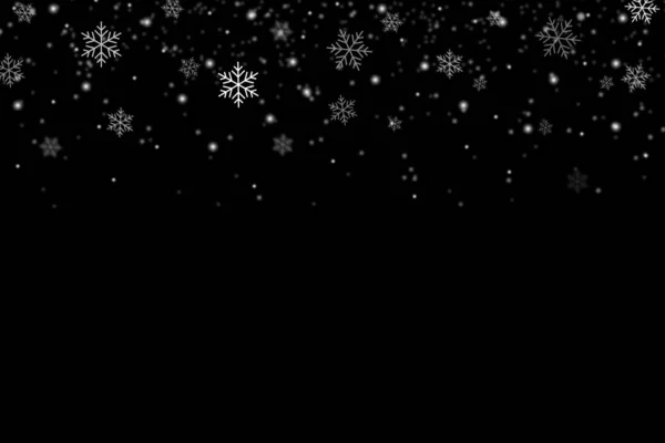 Снежинки падают на рождественские украшения абстрактные черные — стоковое фото
