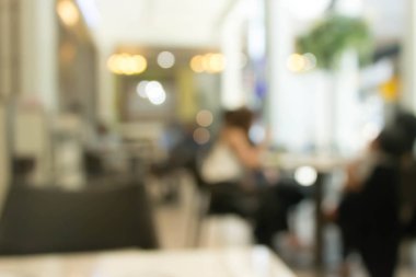 Bokeh ışığıyla bulanık kafe arkaplanı 