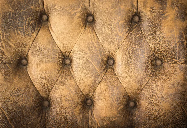 Close up couro marrom vintage de fundo textura sofá. — Fotografia de Stock