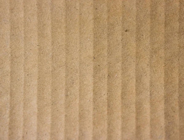 Brown striped recycle paper texture. Kraft cardboard background. — Stock Photo, Image