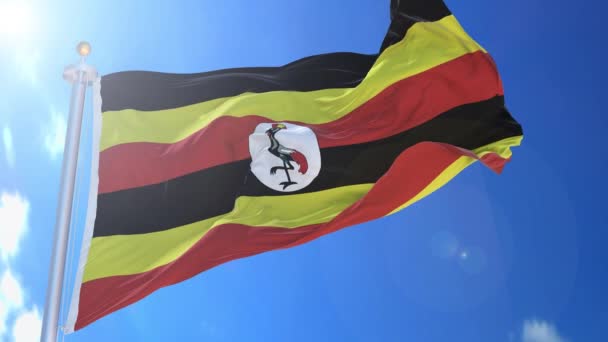 Κινούμενη Σημαία Ουγκάντα Στον Άνεμο Μπλε Ουρανό Στο Παρασκήνιο Πράσινη — Αρχείο Βίντεο