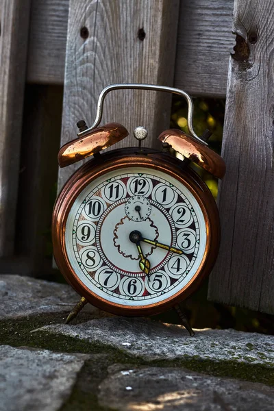 Alarm Clock Next Wooden Fence — 스톡 사진