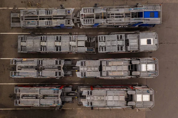 Drone view of big rig semi truck empty car haulers. Directly above.