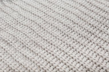 Yünlü örgü kumaş dokusu. Yakın çekim.