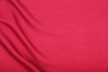 Kırışıklıkları olan kırmızı kumaşın arkaplanı