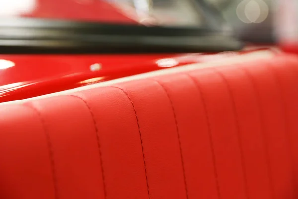 texture of red leather seat close up